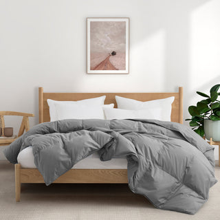 Indulge in the luxurious softness and durability of our organic comforter option in a versatile and chic gray shade, offering a cozy and sustainable way to enrich your sleep experience and enhance your bed in luxury style.