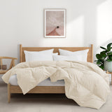 The down feather comforter is covered in solid colors of soft beige or hues of off-white that give it a crisp appearance. Bring natural light to your bedding space and turn it into a cozy spot, while you enjoy the natural feeling of cottony softness with this off white feather comforter.