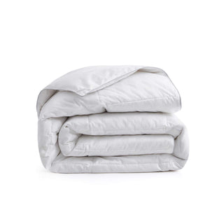 The goose down comforter is encased in soft white shades. Bring a millennial vibe and endless comfort to your bedroom with this goose down feather comforter.