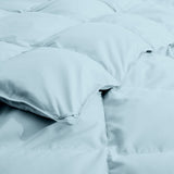 The down comforter with feathers is enveloped in the pristine shades of Sky Blue. Enjoy a cloud-like experience for a cozy sleep with this superior quality down feather comforter with duvet ties.