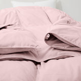 The feather goose down comforter is available in the feminine tones of Pink. Enjoy balanced year-round warmth with this feather goose down comforter.