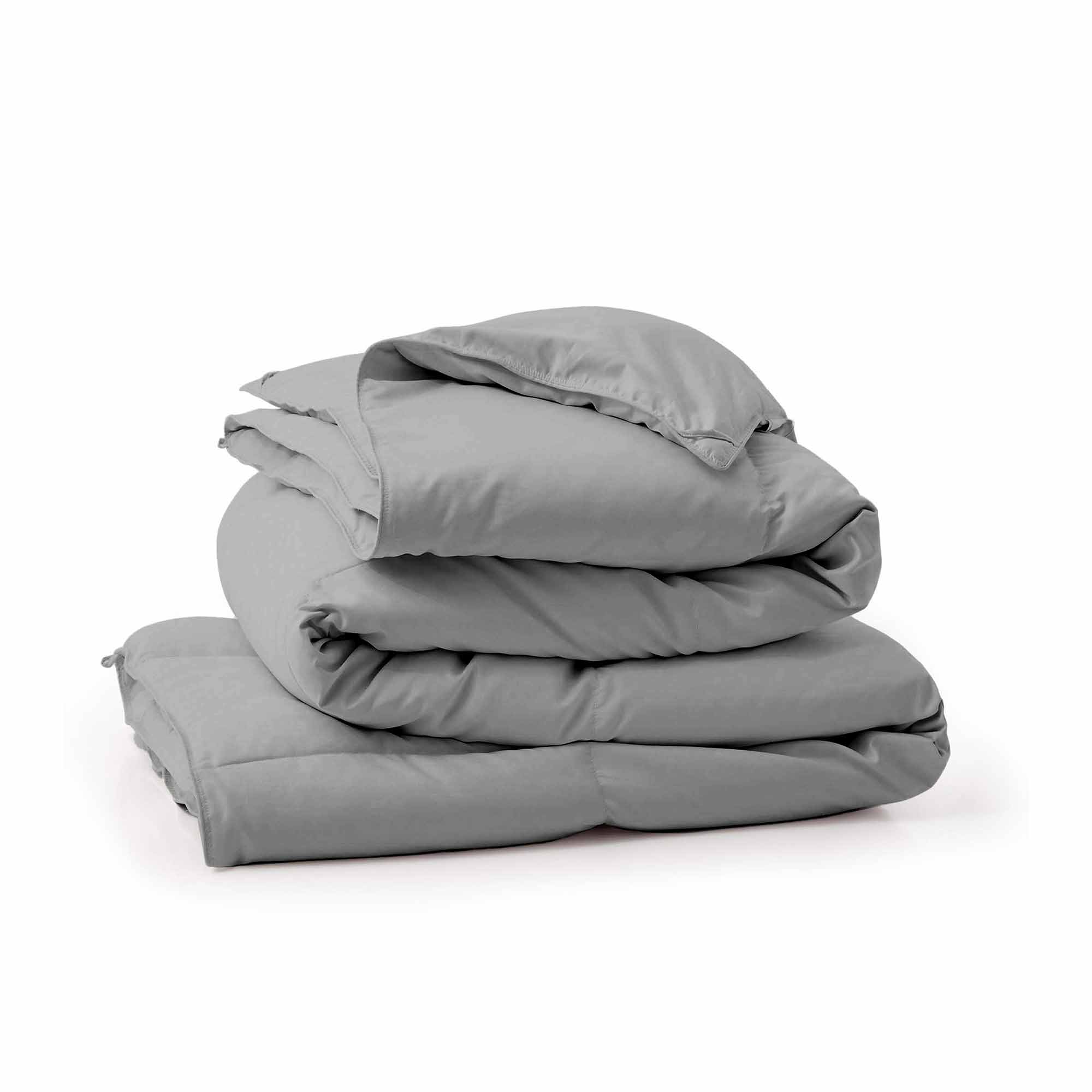 Elevate your bedding with our Gray Goose Feather & Down Comforter, designed for both modern style and cozy comfort. The neutral gray tone brings a sleek, calming vibe to any bedroom, while the soft microfiber shell and breathable down blend keep you warm without overheating—perfect for year-round use.