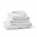 Fresh white tones are brushed over the all-size comforter. Add a touch of all-around luxurious warmth to your modern bedroom design with this down comforter with feathers.