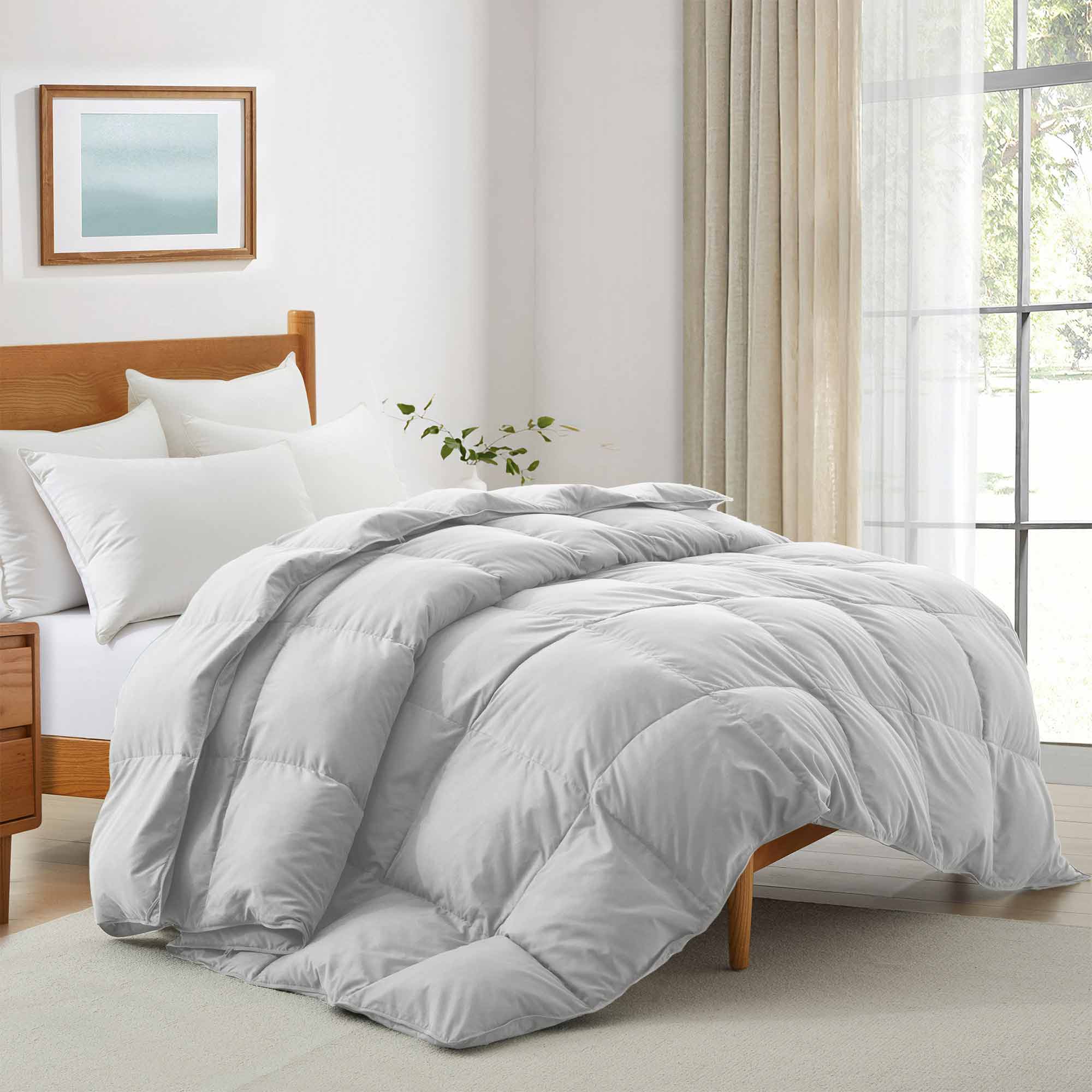 Elevate your bedding with our Gray Goose Feather & Down Comforter, designed for both modern style and cozy comfort. The neutral gray tone brings a sleek, calming vibe to any bedroom, while the soft microfiber shell and breathable down blend keep you warm without overheating—perfect for year-round use.