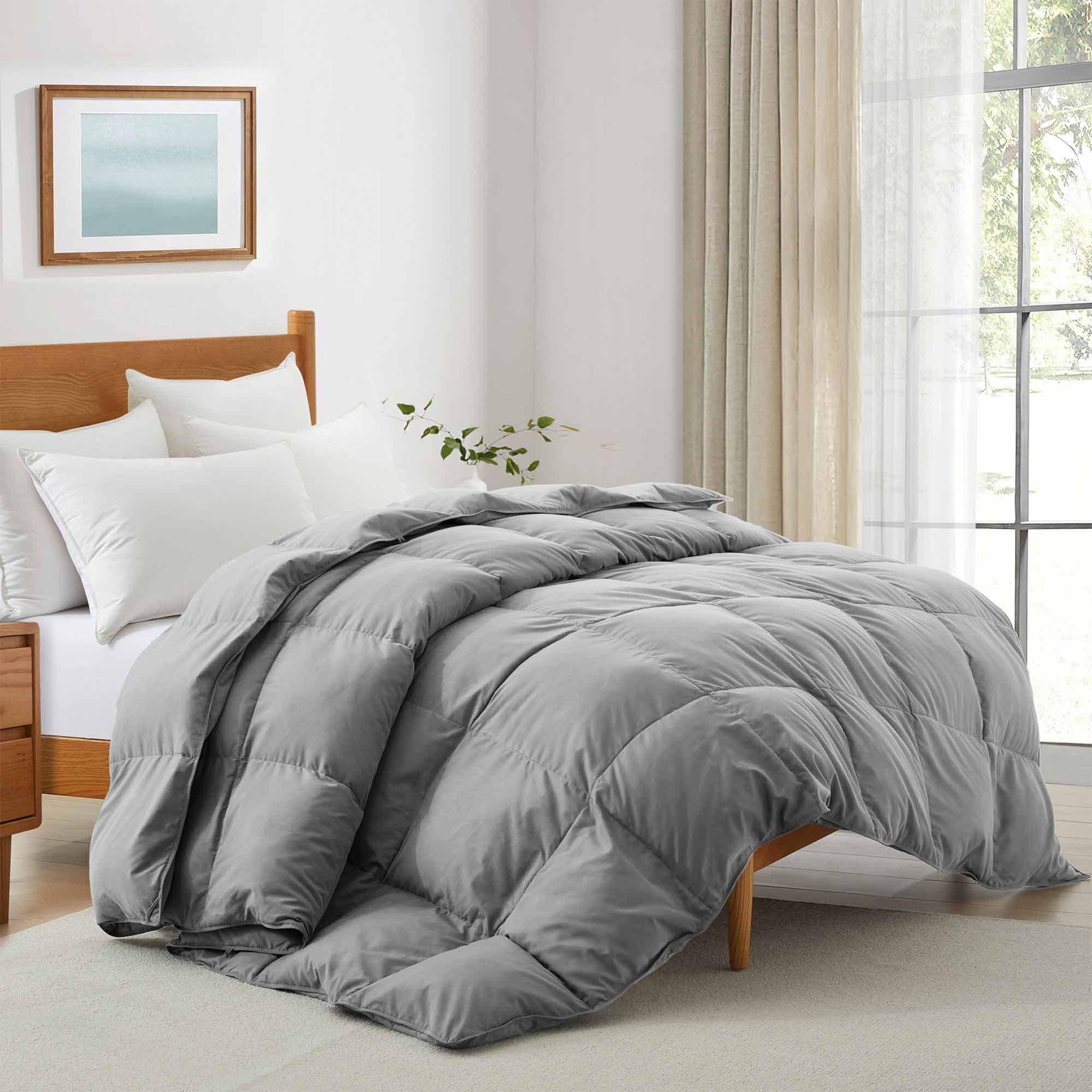 Elevate your bedding with our Gray Goose Feather & Down Comforter, designed for both modern style and cozy comfort. The neutral gray tone brings a sleek, calming vibe to any bedroom, while the soft microfiber shell and breathable down blend keep you warm without overheating—perfect for year-round use.