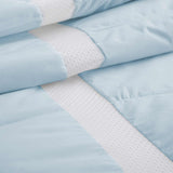 The luxurious comforter with corner tabs is enveloped in the cool tones of Sky Blue. Bring the icy cool freshness of the outdoors to your personal space with this feather down blanket.