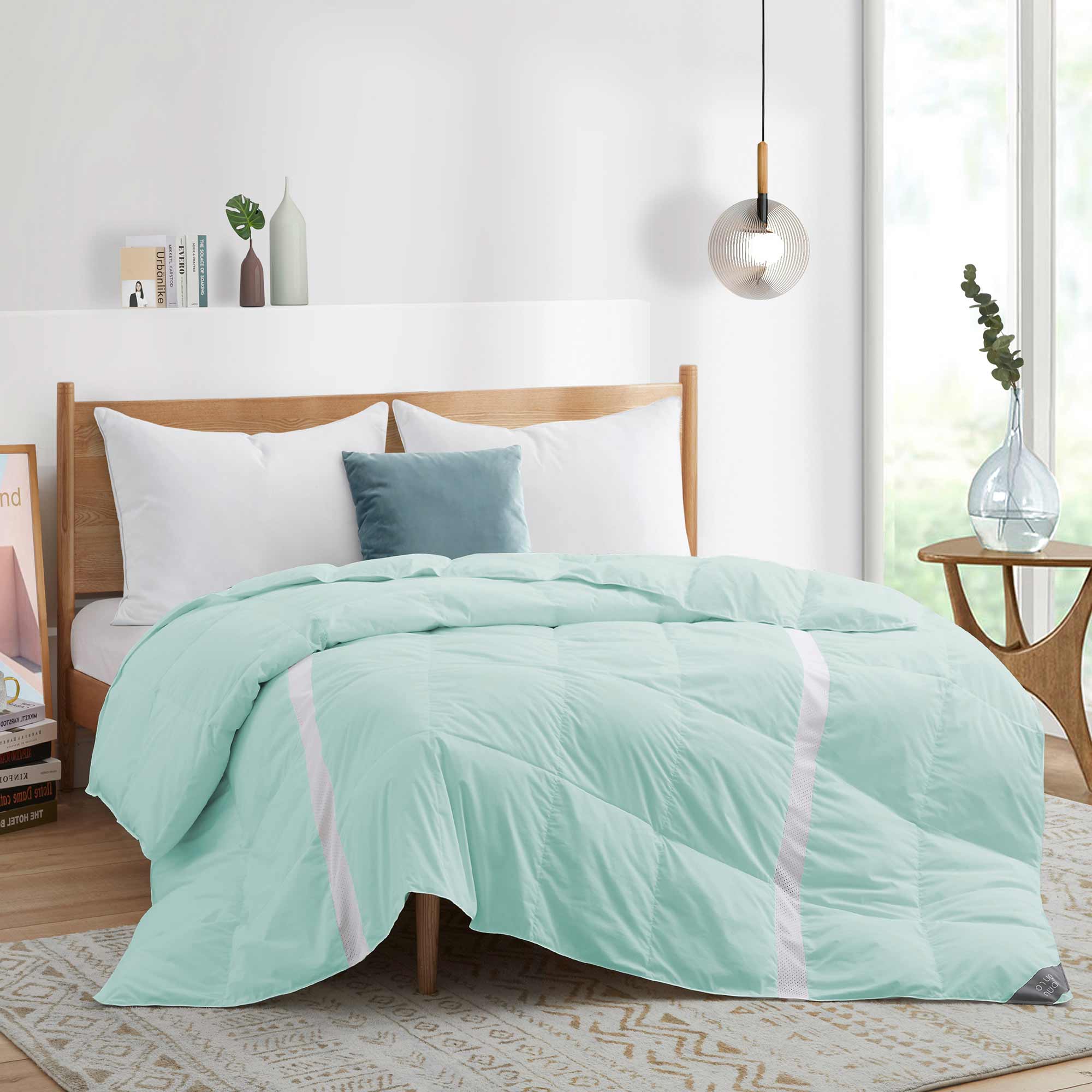 The entire comforter is painted in the refreshing hues of Mint. Welcome the crisp and revitalizing breeze of summer to your abode with this lightweight comforter for summer or feather down blanket.