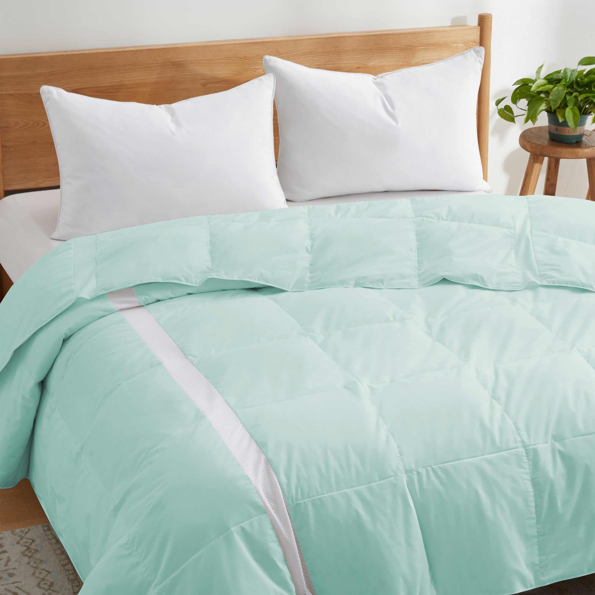 The entire comforter is painted in the refreshing hues of Mint. Welcome the crisp and revitalizing breeze of summer to your abode with this lightweight comforter for summer or feather down blanket.