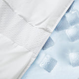 The lightweight summer comforters are brushed in the solid colors of white. Revel in a cloud of comfort in your modern bedroom design with this down blanket.