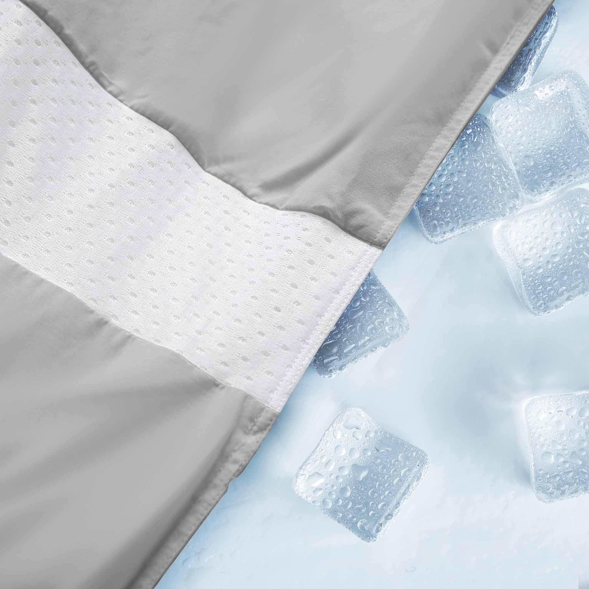 Elevate your sleep experience with the Ultra Lightweight Cooling Down Comforter in sleek gray—a perfect blend of style, breathability, and lightweight warmth. Tailored for hot sleepers and warm climates, this down comforter features cooling mesh fabric and a premium cover that promotes airflow and moisture-wicking to keep you comfortably dry all night