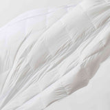 The lightweight summer comforters are brushed in the solid colors of white. Revel in a cloud of comfort in your modern bedroom design with this down blanket.