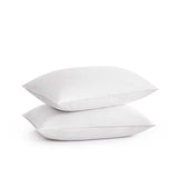 The plush pillow design is colored in the harmonious tones of white. Add a welcoming feel and luxurious comfort to your bedroom space with these overstuffed feather pillows.