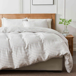 This linen bedding is covered in a refined gray and white textured stripe pattern. Experience the seamless blend of sophistication and simplicity with this gray stripe linen duvet cover set.