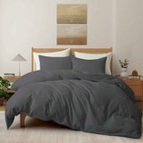 Deep charcoal gray duvet cover and pillowcases made from soft linen-cotton blend.