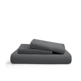 Deep charcoal gray duvet cover and pillowcases made from soft linen-cotton blend.
