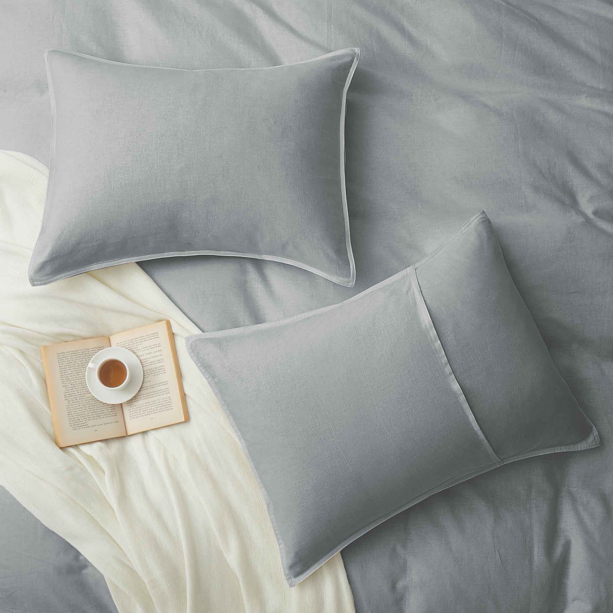 Add a touch of modern elegance with the Gray Linen Cotton Blend Duvet Cover Set. The soft, neutral gray complements any style while offering a calm and cozy atmosphere. Crafted from a breathable linen-cotton blend, this set ensures optimal airflow and comfort for hot sleepers and warm climates.
