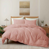 Soft rose taupe linen-cotton duvet cover and pillowcases in muted pink-beige.