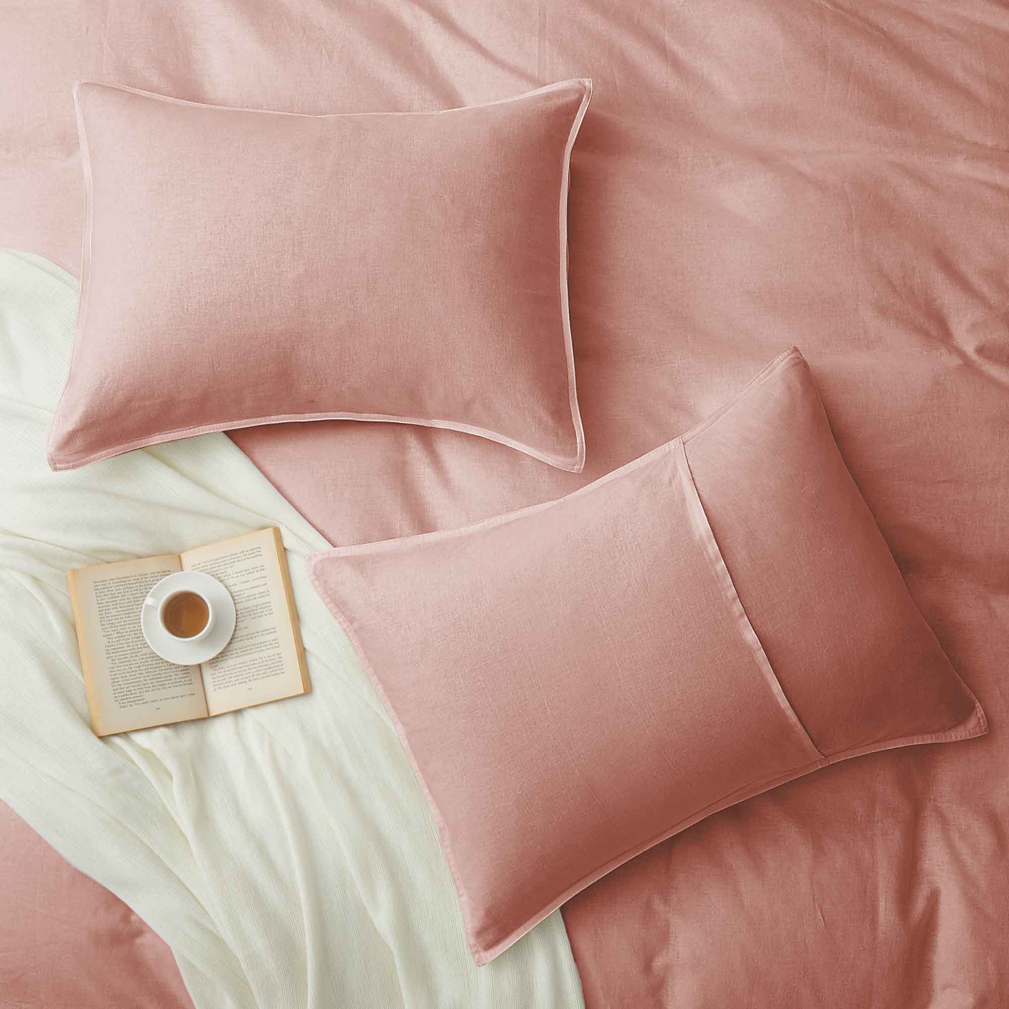 Soft rose taupe linen-cotton duvet cover and pillowcases in muted pink-beige.