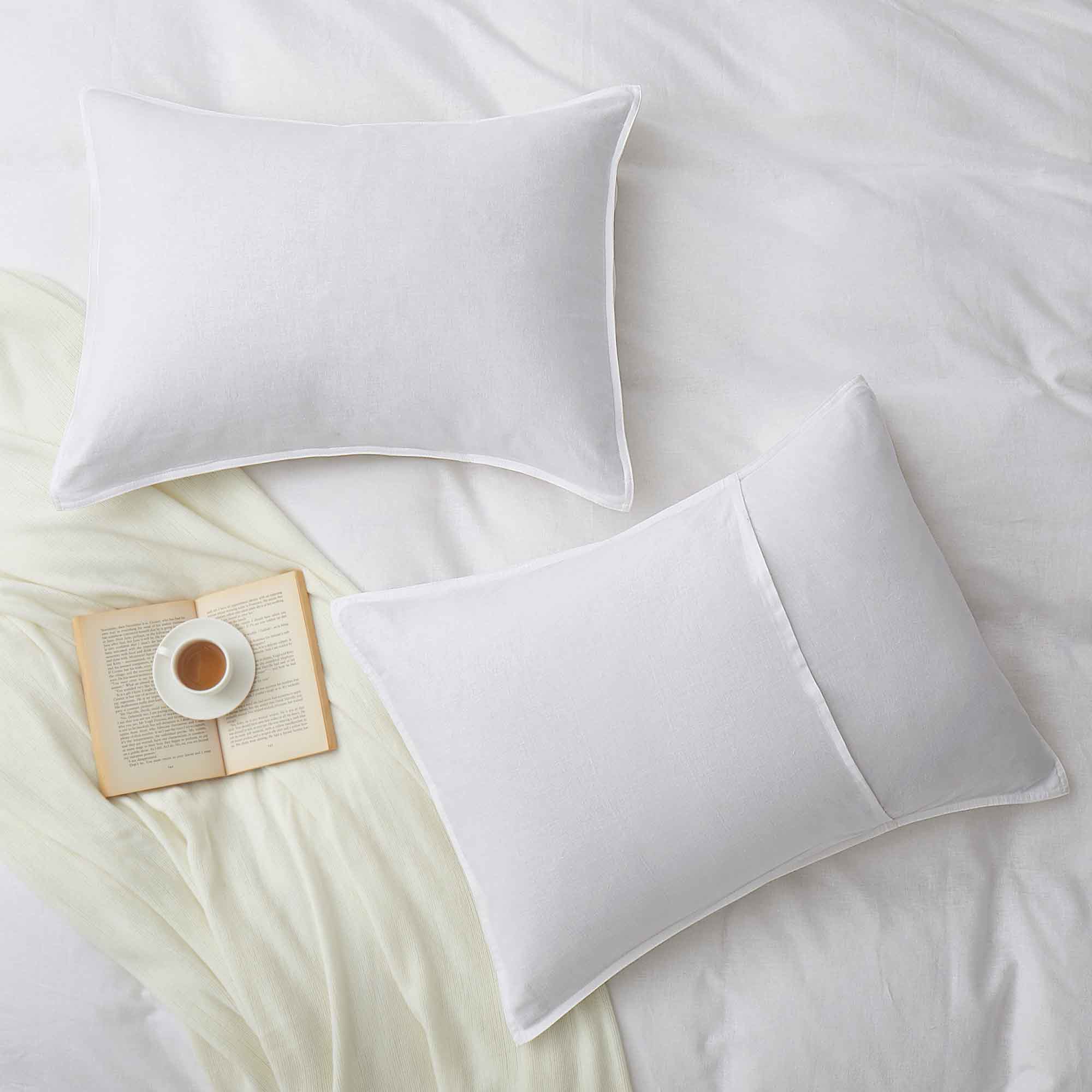 Elevate your bedding with the crisp, timeless look of our White Linen Cotton Blend Duvet Cover Set. The clean white color offers a fresh, minimalist aesthetic, perfect for any bedroom décor. Made from a breathable 55% linen and 45% cotton blend, this set is soft, moisture-wicking, and ideal for year-round comfort.