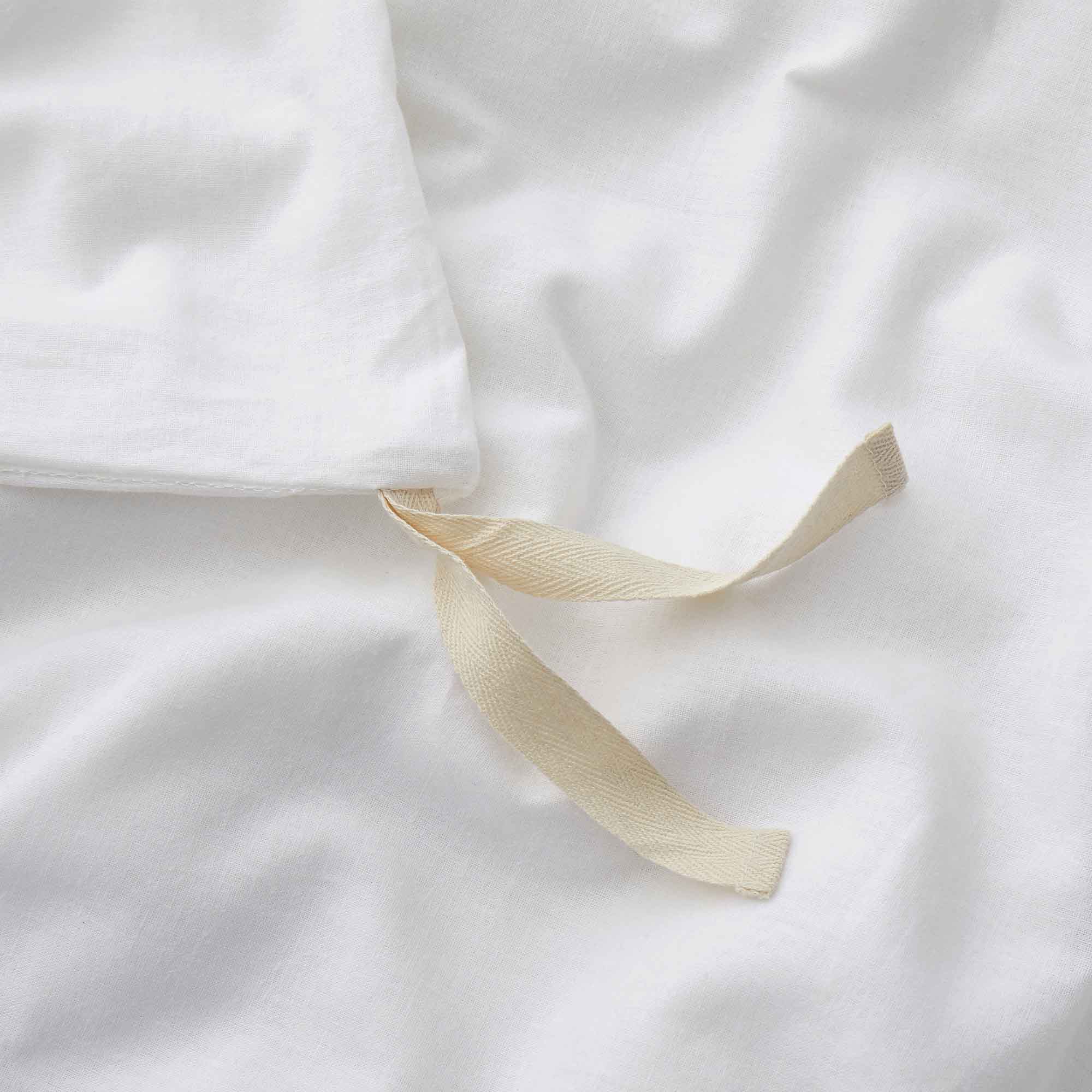 Elevate your bedding with the crisp, timeless look of our White Linen Cotton Blend Duvet Cover Set. The clean white color offers a fresh, minimalist aesthetic, perfect for any bedroom décor. Made from a breathable 55% linen and 45% cotton blend, this set is soft, moisture-wicking, and ideal for year-round comfort.