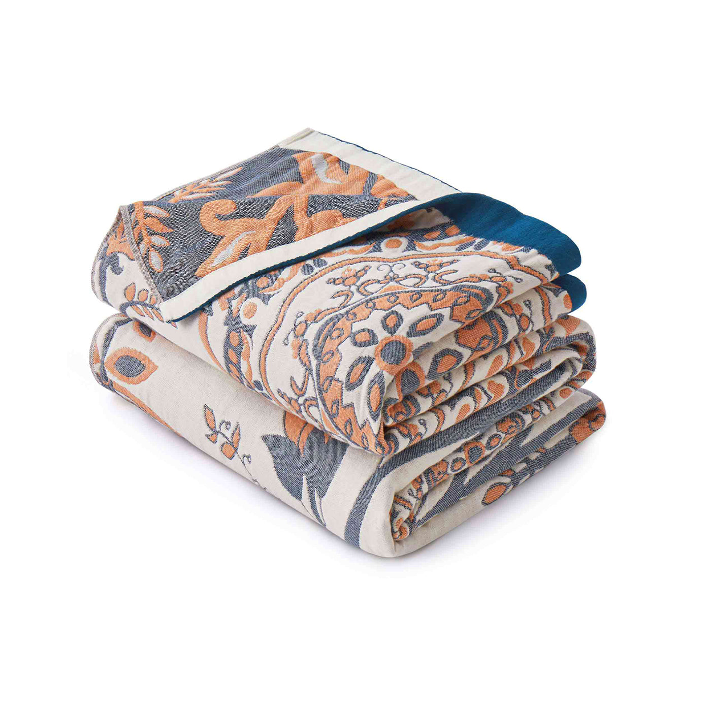 Cream-colored velvet throw blanket with intricate orange and navy medallion and vine patterns, finished with a navy blue border.