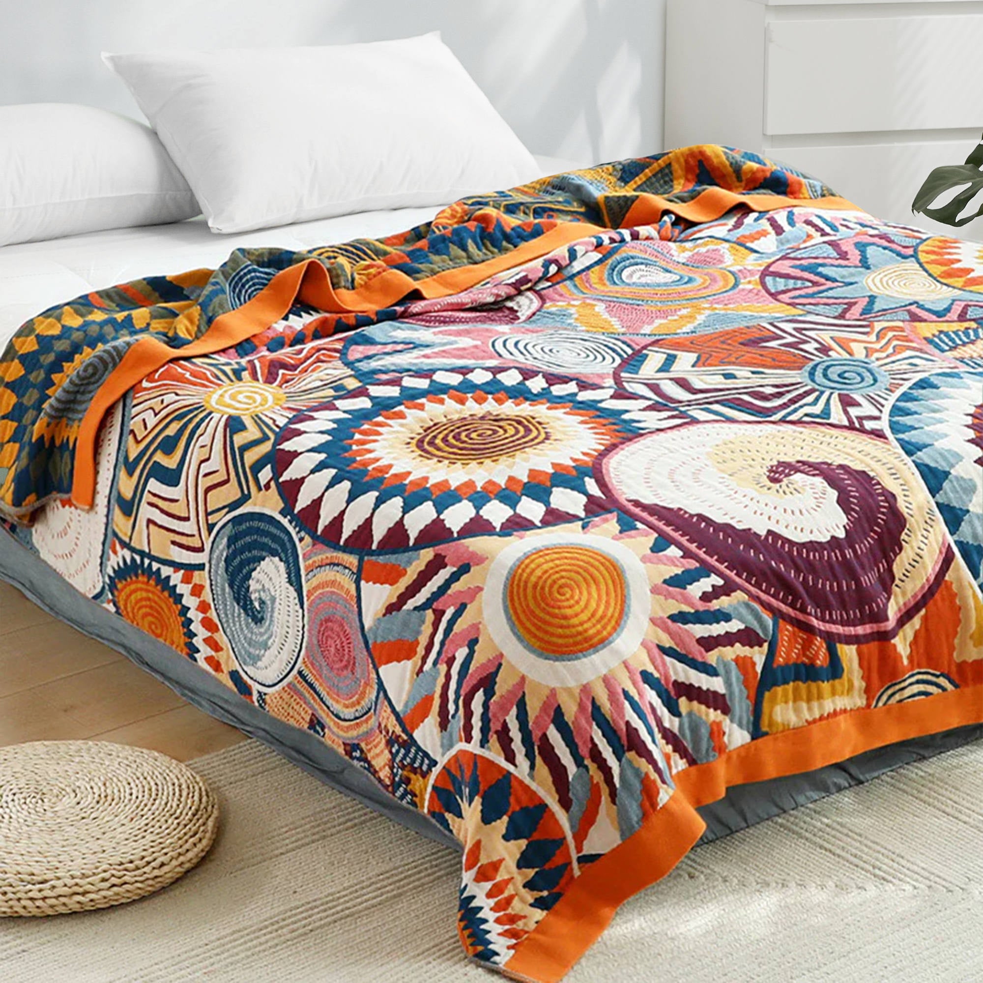 The couch blanket features abstract patterns of sunrise in vivid hues. Welcome the bright and shiny summers with this sweet blanket in Sunrise style.