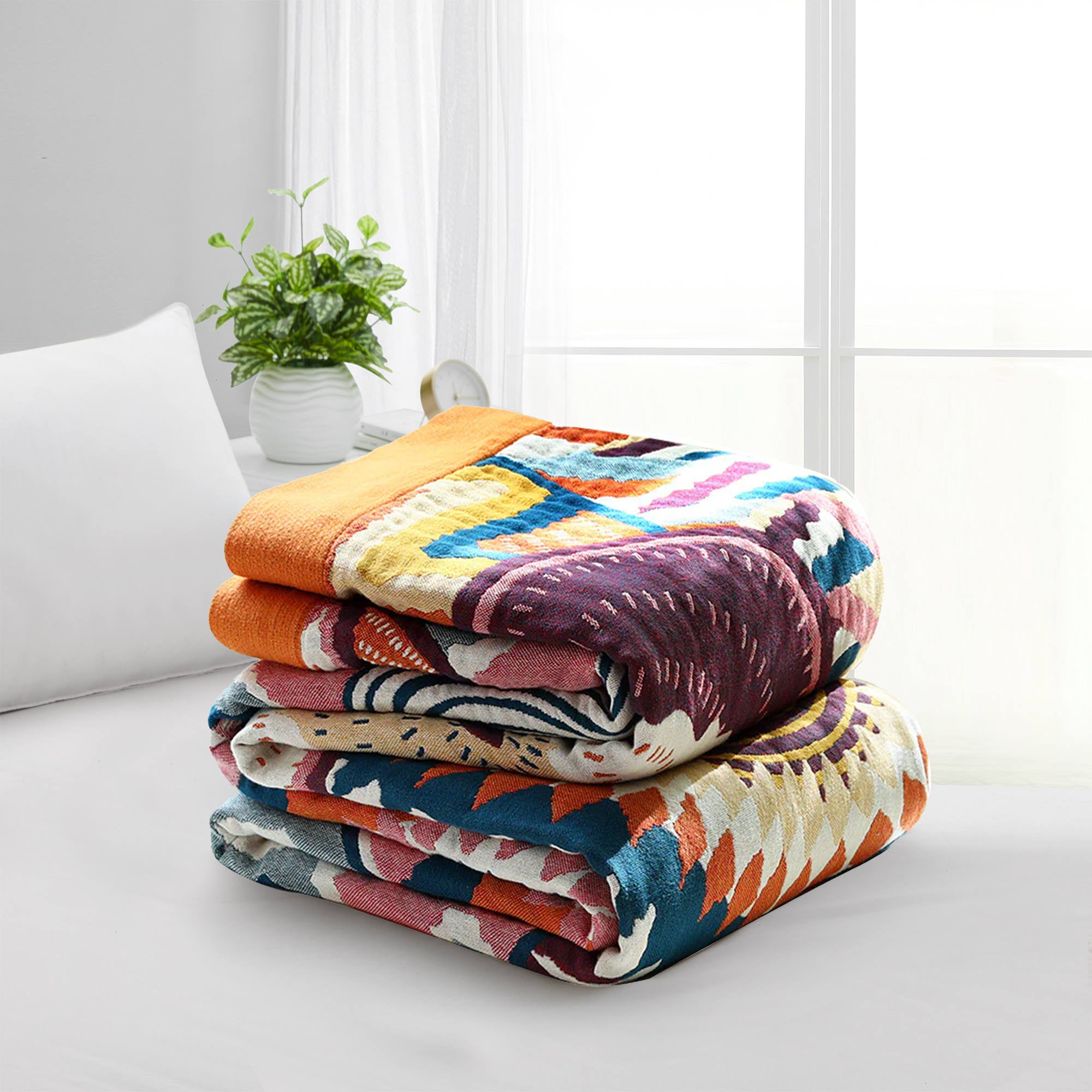 The couch blanket features abstract patterns of sunrise in vivid hues. Welcome the bright and shiny summers with this sweet blanket in Sunrise style.