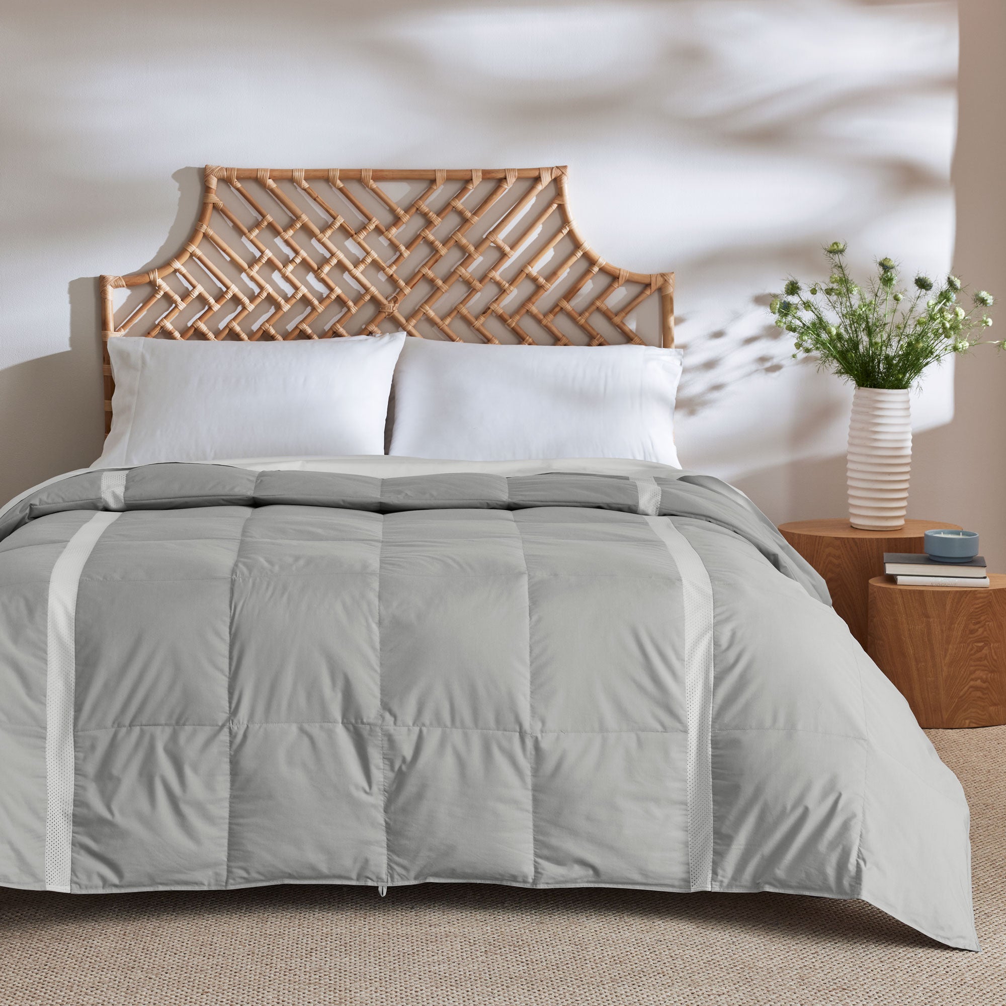 Elevate your sleep experience with the Ultra Lightweight Cooling Down Comforter in sleek gray—a perfect blend of style, breathability, and lightweight warmth. Tailored for hot sleepers and warm climates, this down comforter features cooling mesh fabric and a premium cover that promotes airflow and moisture-wicking to keep you comfortably dry all night