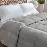 Elevate your sleep experience with the Ultra Lightweight Cooling Down Comforter in sleek gray—a perfect blend of style, breathability, and lightweight warmth. Tailored for hot sleepers and warm climates, this down comforter features cooling mesh fabric and a premium cover that promotes airflow and moisture-wicking to keep you comfortably dry all night