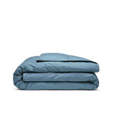Elevate your sleep setup with our Castle Blue Organic Cotton Comforter, featuring a deep, rich blue hue that brings bold elegance to any bedroom. Made with GOTS-certified organic cotton and filled with down and feather fiber, this luxurious comforter offers breathable warmth and long-lasting comfort. Ideal for modern or dramatic interiors, the Castle Blue version is a statement piece that combines sustainable materials with sophisticated design