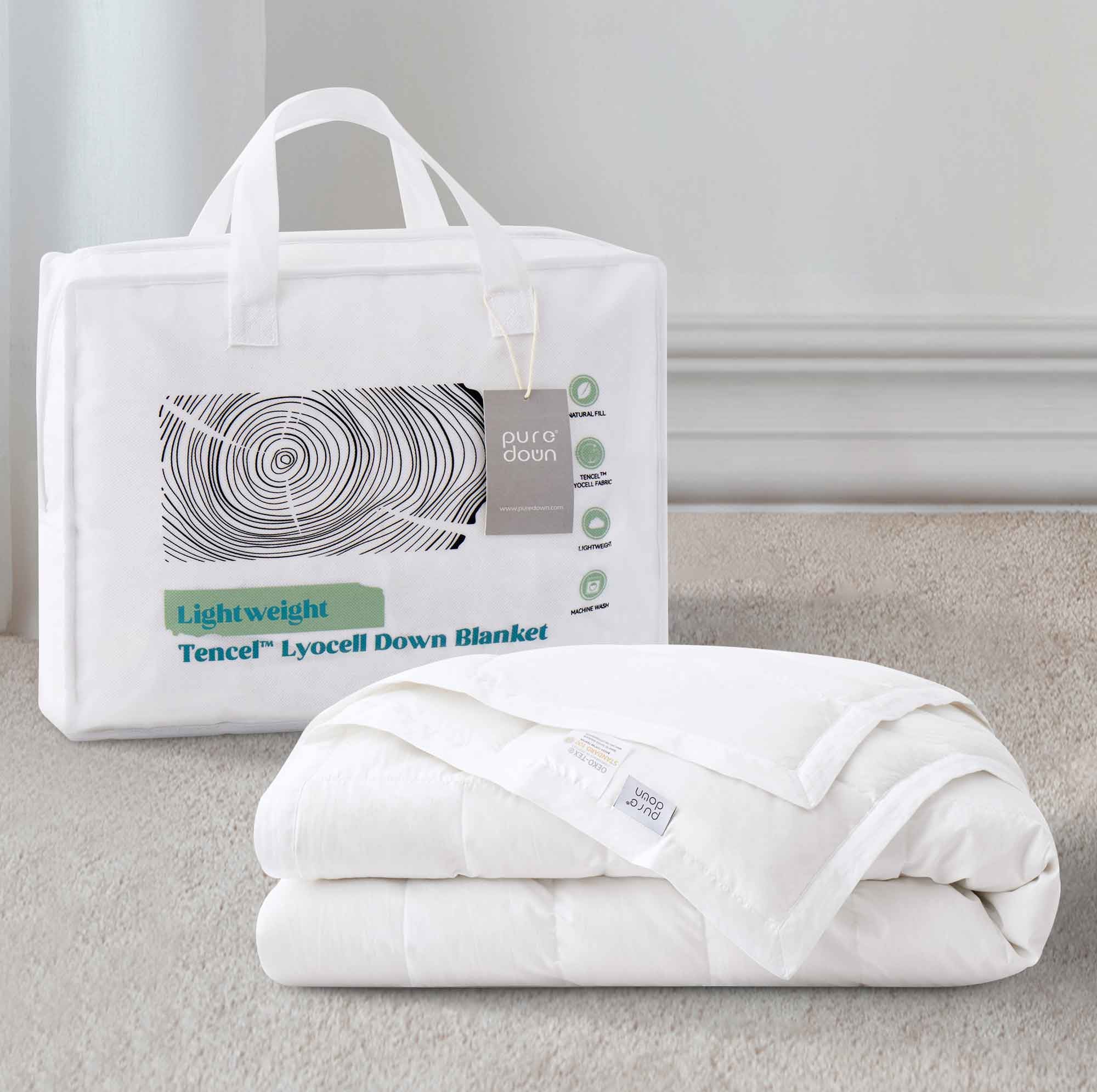 This down blanket is covered in pristine hues of white. Enjoy the coolest sleep every night with these white down blankets.