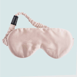 The contoured mask with a smooth surface is enveloped in the pristine hues of dawn pink. Add a feminine touch to your sleep accessories with this eye mask.