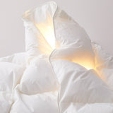 The warm comforter is covered in beautiful tones of white. A valuable element in your bedding décor, let this white comforter add a touch of classic intrigue to your bedding space.