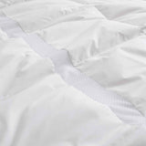 The lightweight summer comforters are brushed in the solid colors of white. Revel in a cloud of comfort in your modern bedroom design with this down blanket.