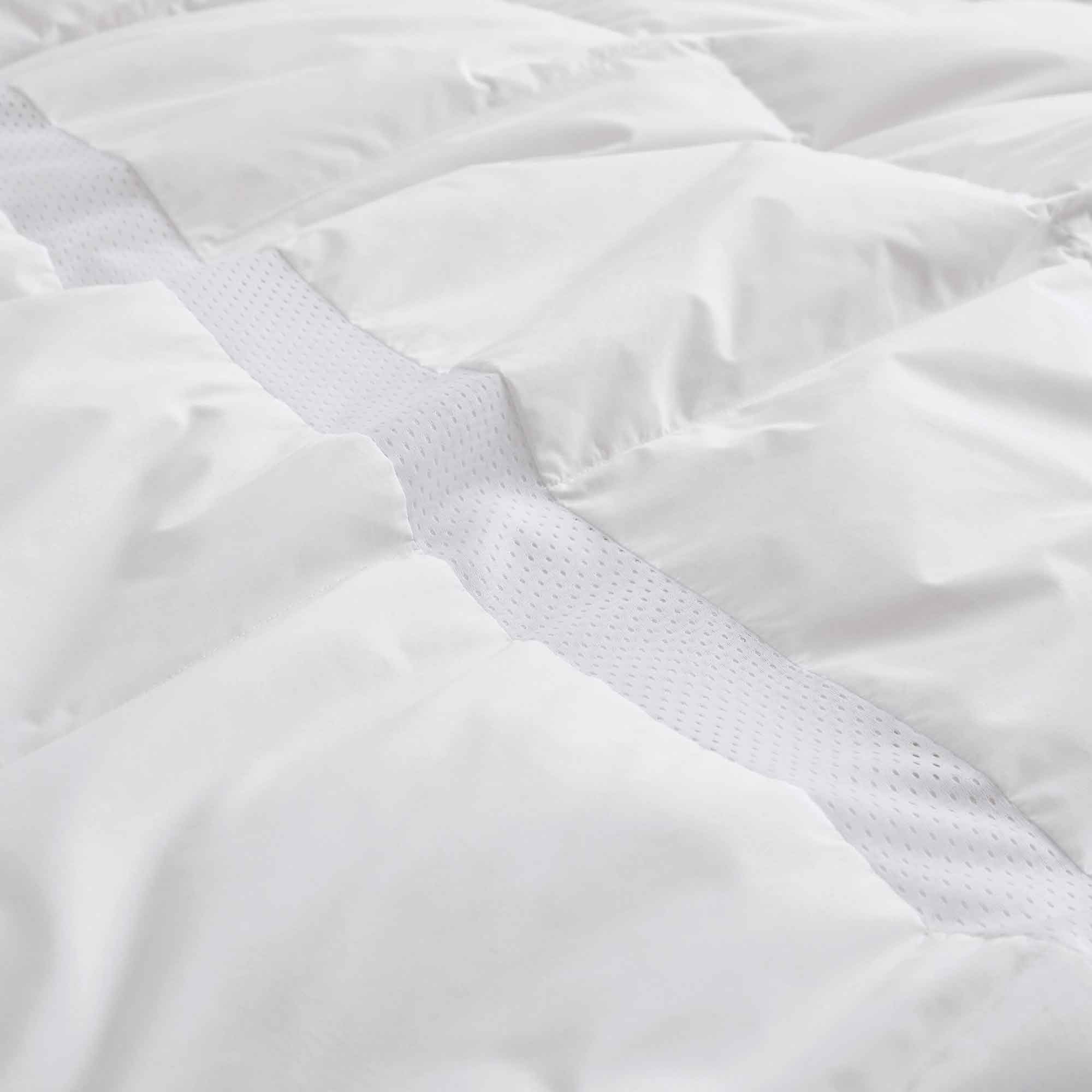 The lightweight summer comforters are brushed in the solid colors of white. Revel in a cloud of comfort in your modern bedroom design with this down blanket.