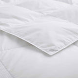 The lightweight summer comforters are brushed in the solid colors of white. Revel in a cloud of comfort in your modern bedroom design with this down blanket.