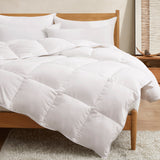 The down feather comforter is covered in solid colors of white. Add an air of elegance and bring perfect levels of warmth to your bedding decor, turning it into a cozy spot with this white color down comforter.