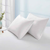 The plush pillow design is colored in the harmonious tones of white. Add a welcoming feel and luxurious comfort to your bedroom space with these overstuffed feather pillows.