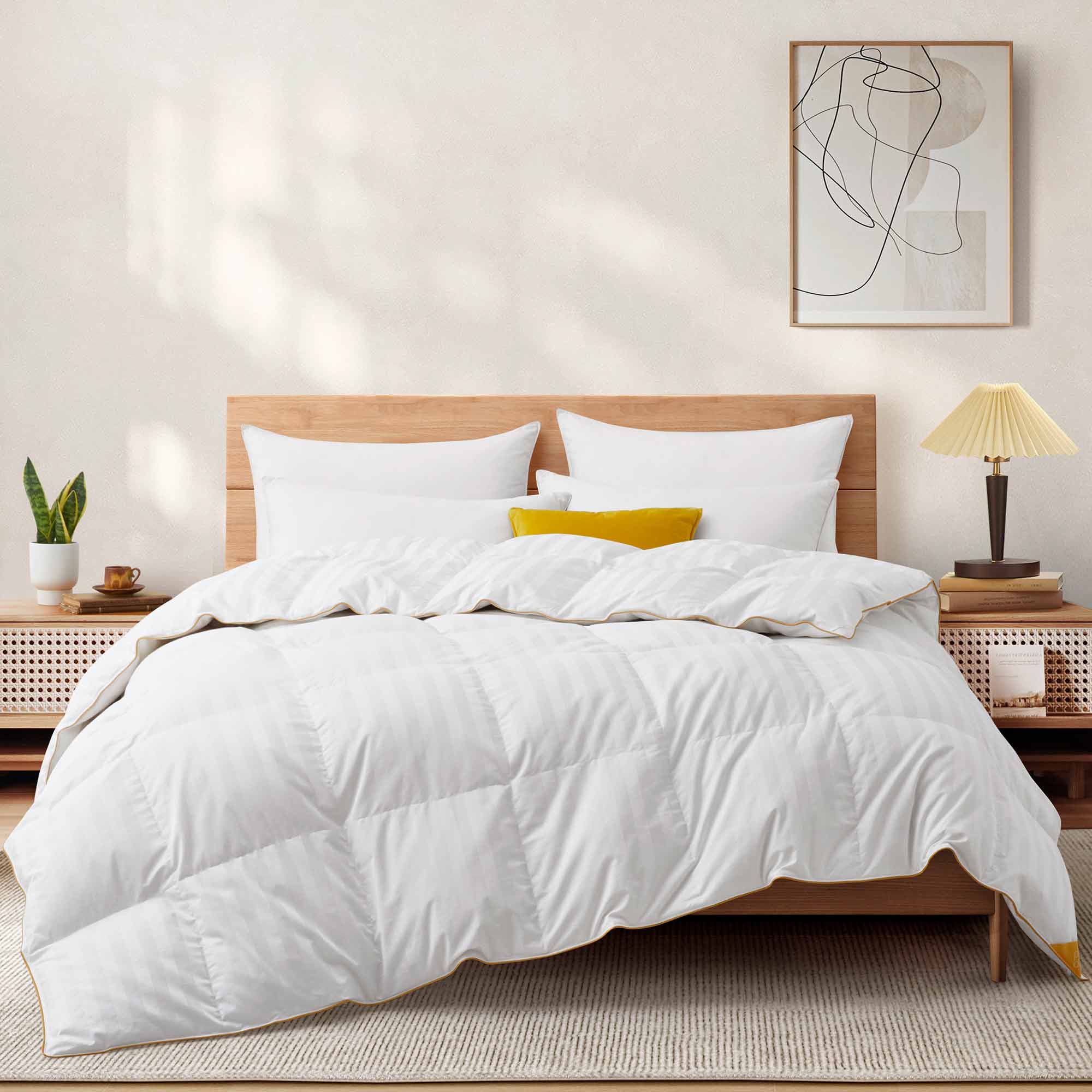 The all season down comforter is covered in the solid color of white. Add brightness and light to your room with this goose-down comforter.