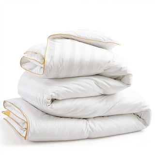 The all season down comforter is covered in the solid color of white. Add brightness and light to your room with this goose-down comforter.