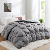 Transform your bedroom into a serene and tranquil oasis with our goose down comforter in a chic and versatile grey shade. This grey down comforter offers a cozy and stylish way to stay warm and comfortable all night long.