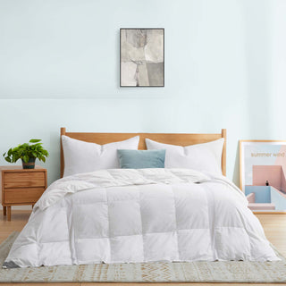 The lightweight summer comforters are brushed in the solid colors of white. Revel in a cloud of comfort in your modern bedroom design with this down blanket.