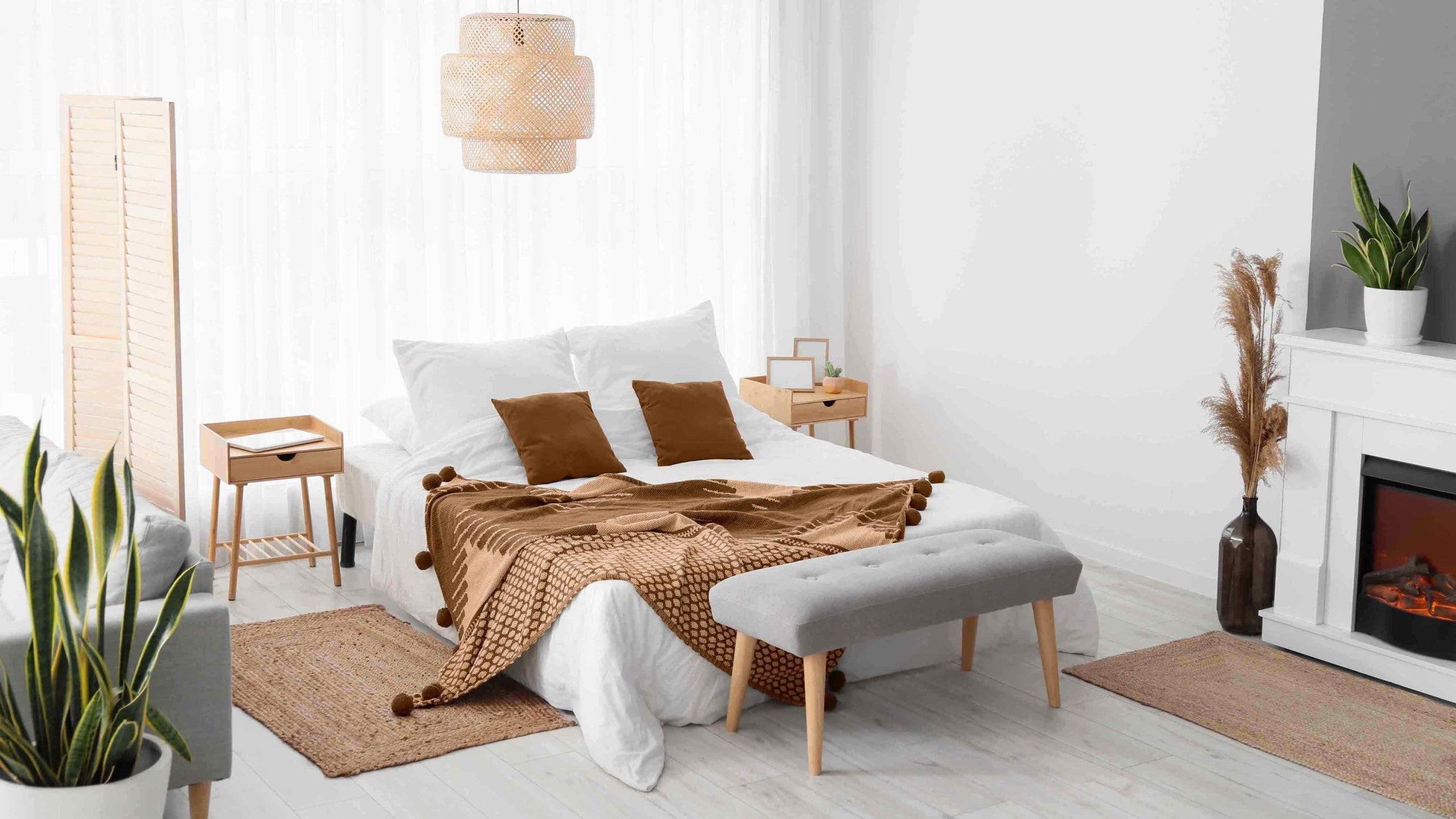 Our Guide to Layering Your Bed With Down Comforters
