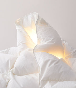 a white blanket with a light on it