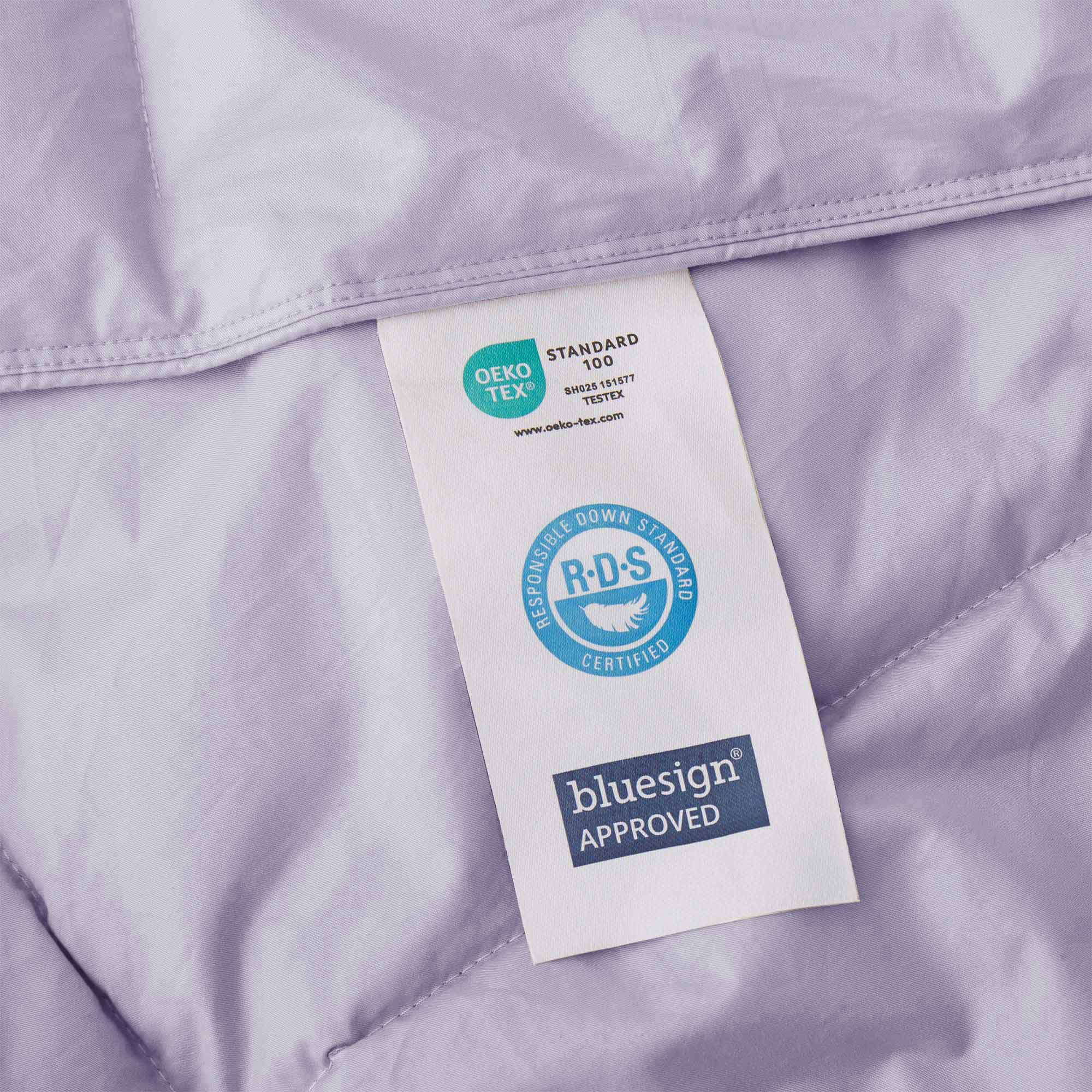 Elevate your sleep sanctuary with the calming elegance of our Lavender Organic Cotton Down Comforter. This soft lavender shade adds a touch of serenity and gentle color to your bedroom, making it a perfect choice for creating a peaceful, spa-like atmosphere. Crafted from 100% GOTS-certified organic cotton and generously filled with down and feather fiber, this comforter is breathable, lightweight, and ideal for all seasons. Whether you're a hot sleeper or need cozy layering in cooler months, its natural ins