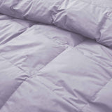 Elevate your sleep sanctuary with the calming elegance of our Lavender Organic Cotton Down Comforter. This soft lavender shade adds a touch of serenity and gentle color to your bedroom, making it a perfect choice for creating a peaceful, spa-like atmosphere. Crafted from 100% GOTS-certified organic cotton and generously filled with down and feather fiber, this comforter is breathable, lightweight, and ideal for all seasons. Whether you're a hot sleeper or need cozy layering in cooler months, its natural ins