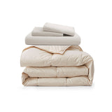 This bundle pairs an all-season organic cotton down comforter with a breathable linen-cotton duvet cover set for year-round comfort and natural luxury.