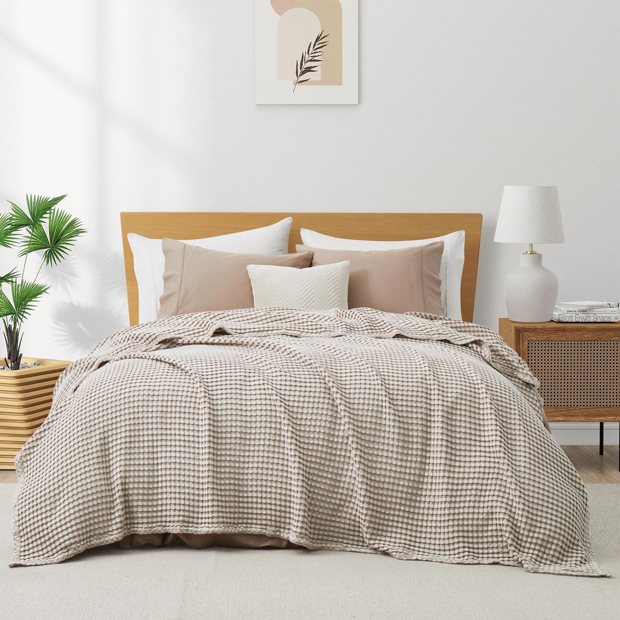The all-weather blanket is covered in a beige color with soft camel undertones. Add a dimensional texture to your modern home décor with this perfectly pretty warm-season blanket for comfort.