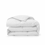 Experience timeless comfort with our White Organic Cotton Down Comforter — a must-have for those who value clean, classic bedding. Crafted from GOTS-certified organic cotton and filled with 100% down and feather fiber, this breathable and lightweight comforter is perfect for all-season use. The crisp white color creates a fresh, hotel-quality look while offering unmatched softness and natural temperature regulation. Whether styled alone or layered with other bedding, this white comforter elevates any bedroo
