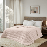 The down blanket is brushed in soft tones of pink. Add a touch of subtle beauty to your room with this cooling tencel lyocell blanket.